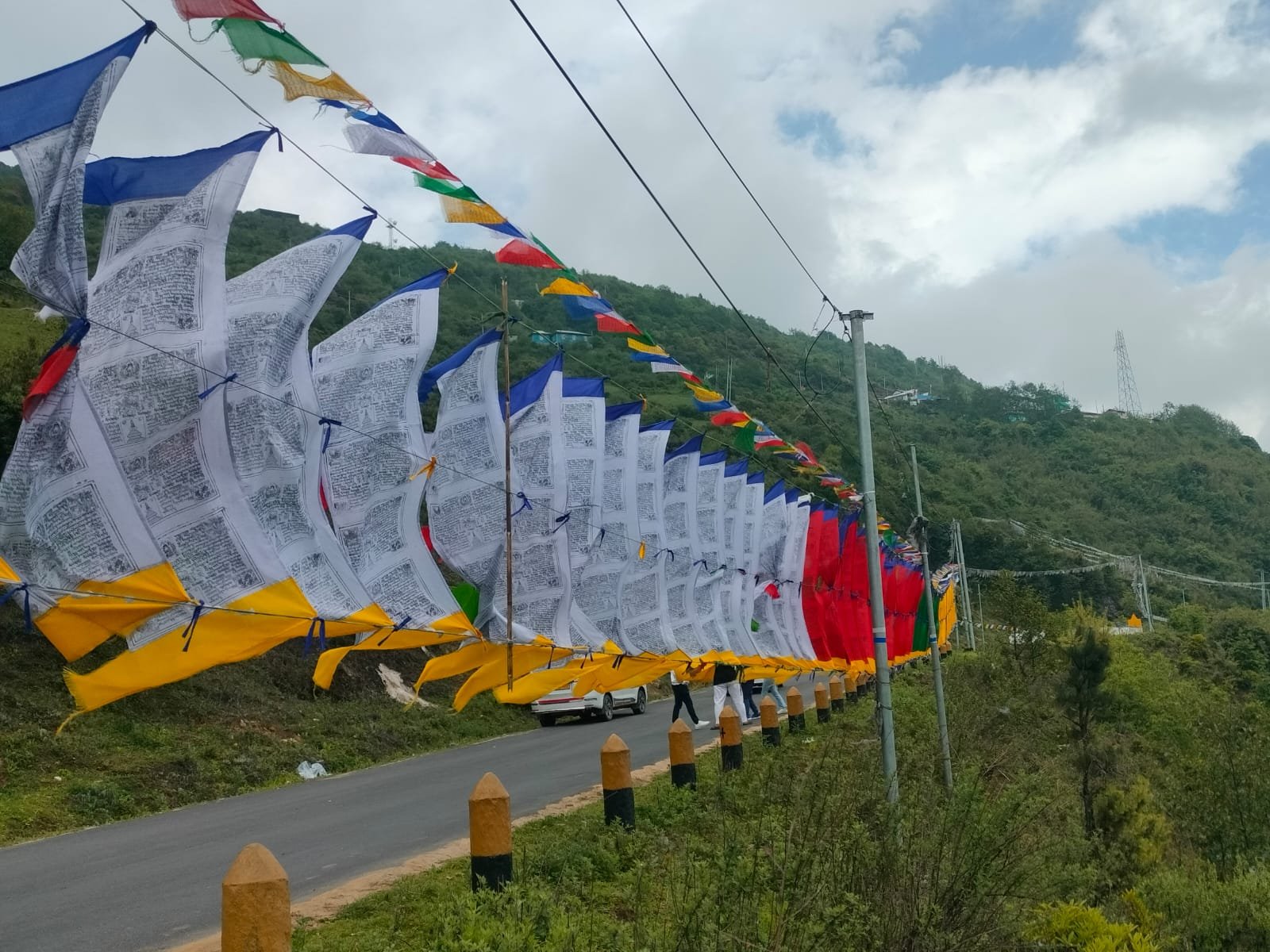 Giant prayer flags on the mountain road to Tawang