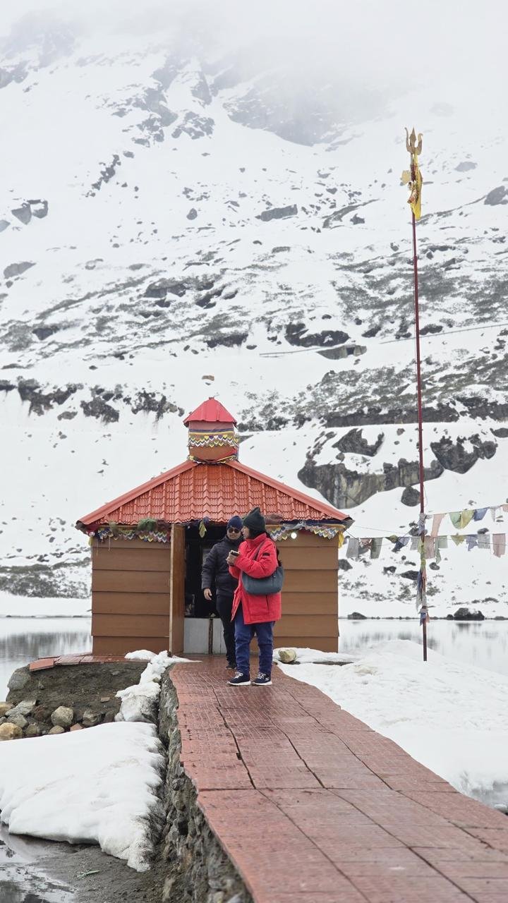Guests at the Sela Lake shrine in winter