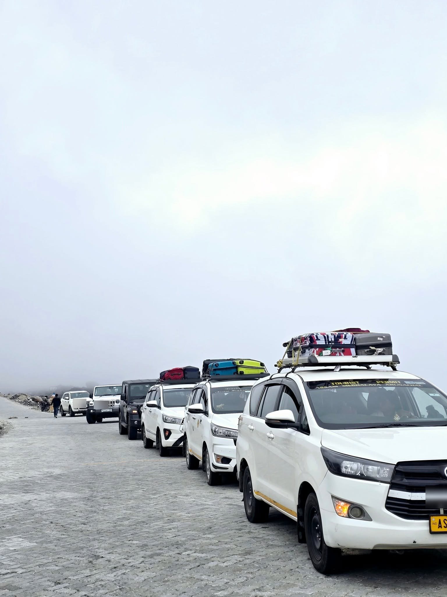 Tourist permit Innova convoy at Sela Pass